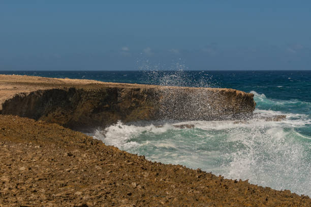 istock Waves a long the shores on Aruba island 1125461005