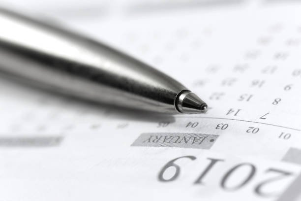 istock Pen and plan a date in the new year 1125462773