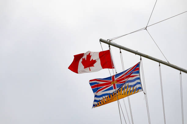 istock Canadian and British Columbian flags 1125464887