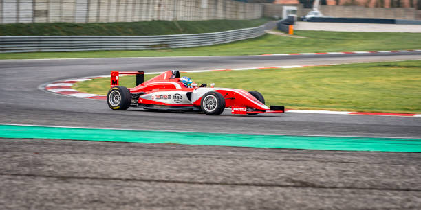 istock Red formula race car on the track 1125471577