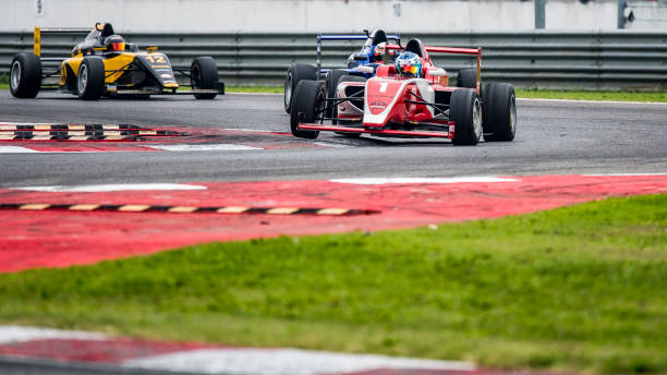 istock Formula race cars on a race track 1125471581