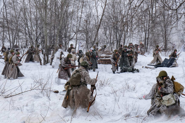 Soviet and German soldiers in winter reconstruction of World War 2, Battle for Voronezh rebellion Voronezh, Russia - January 27, 2019: Soviet and German soldiers in winter reconstruction of World War 2, Battle for Voronezh rebellion historical reenactment stock pictures, royalty-free photos & images