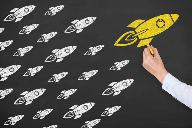istock Leadership Concepts with Rockets on Chalkboard 1125482698