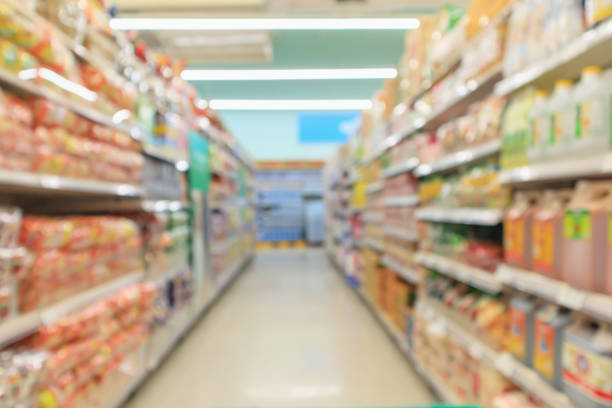 istock supermarket aisle shelf interior abstract blur background 1125483048