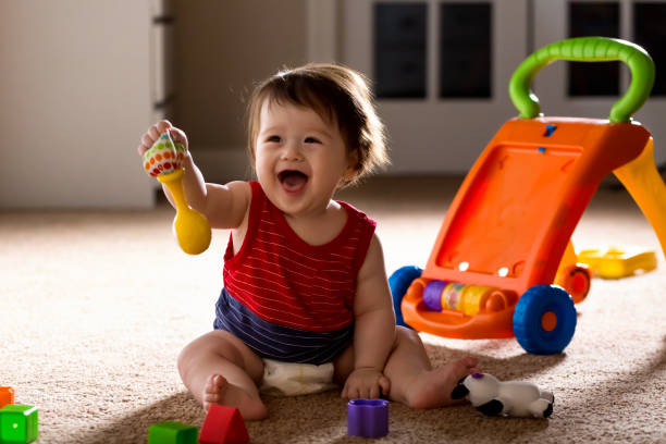 istock Happy boy playing with his toys 1125484550