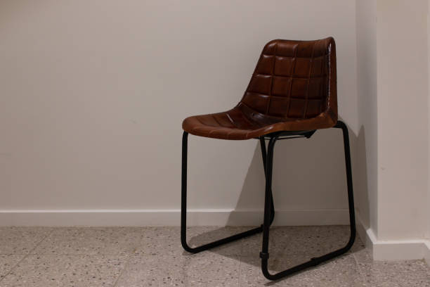 istock wooden white chair on a room 1125487380