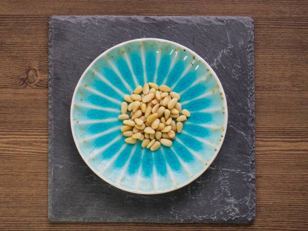 istock Pine nuts in a porcelain dish 1125491650