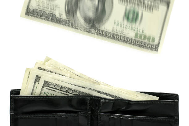Blown wallet and dollar notes isolated on white background.