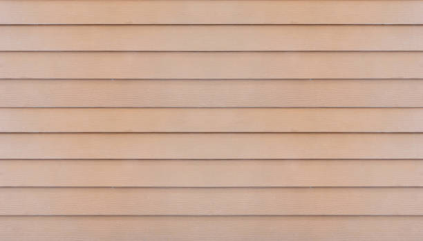 istock Closeup surface old wood board at the wall texture background 1125518392
