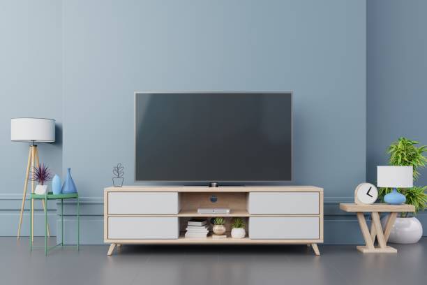 istock Tv design on cabinet interior modern room with plants,shelf,lamp 1125525131
