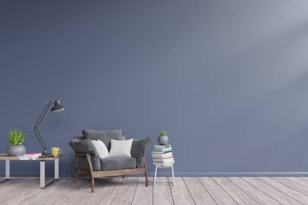 istock Living Room Interior with dark armchair, plants,lamp, table 1125525132