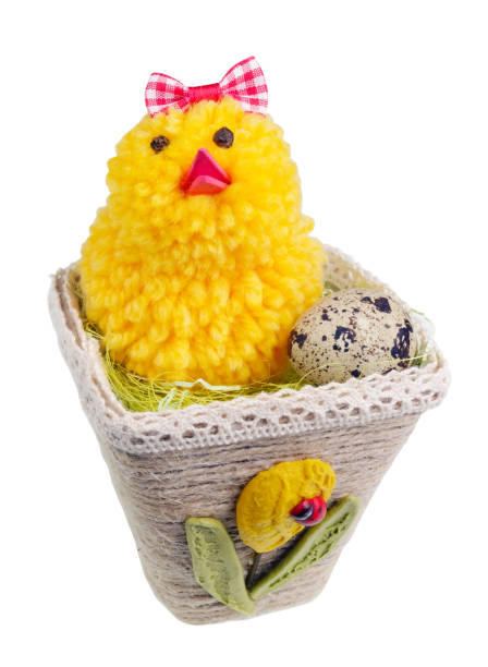 istock Easter handmade  nest from rope with funny chicken and egg. Isolated 1125543740