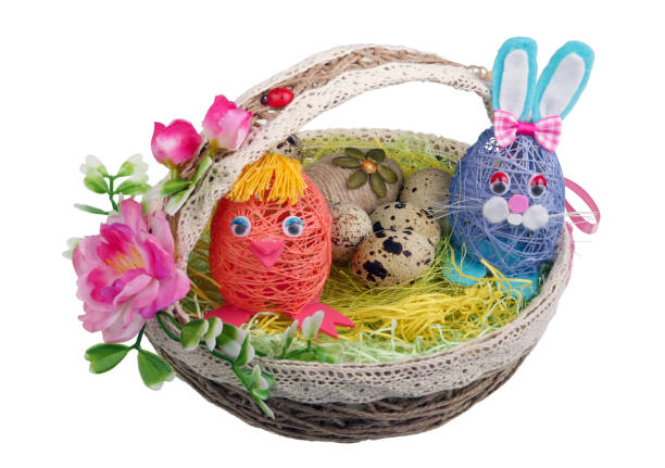 istock Easter handmade  nest from rope with funny chicken bunny  and eggs. Isolated 1125543756
