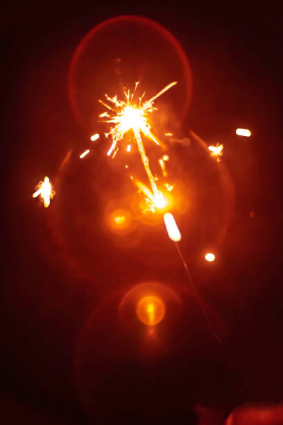istock Flame of night fireworks and round bokeh lights 1125545616