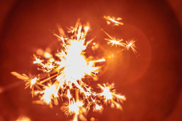 Flame of fireworks at night