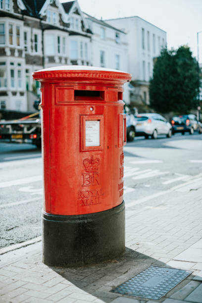 istock Iconic red British mailbox in a city 1125547639