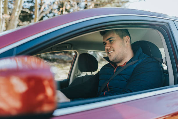 istock Young man inside the car getting ready to leave 1125548707