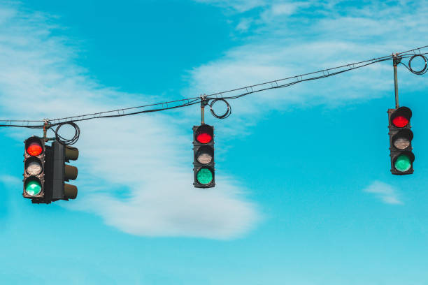 istock Traffic light with green light and blue sky 1125549599
