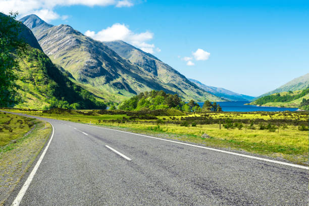 istock Winding mountain road without cars 1125549821
