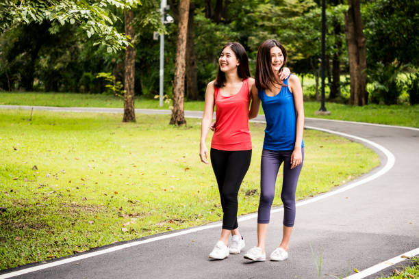 istock Attractive young women walking after exercise in a park 1125554348