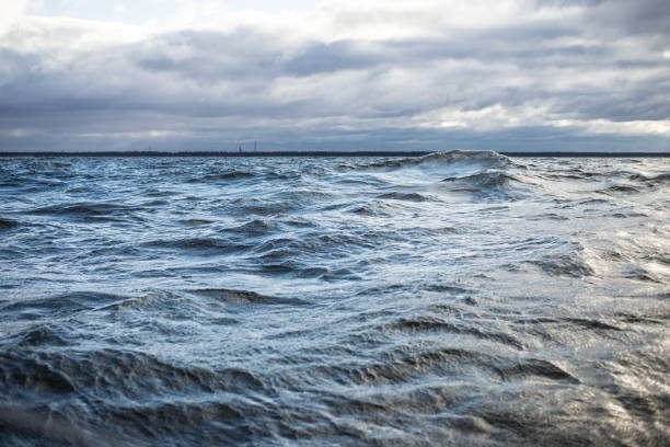istock Winter sailing. Cold blue sea at sunset. waves and clouds, Norway 1125565116