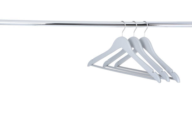 istock Wooden hangers hanging on white background 1125570677