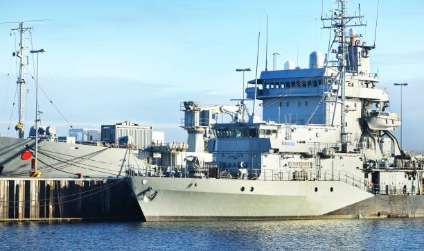istock Moored military ships on a pier in Kiel 1125571048