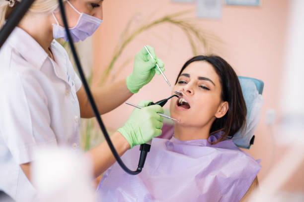 istock Woman having teeth examined at dentists 1125575616