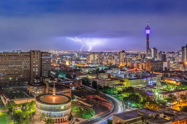Johannesburg storm and lightning with Hillbrow tower and Council Chamber building below.
Johannesburg, also known as Jozi, Jo'burg or eGoli, "city of gold" is the largest city in South Africa. It is the provincial capital of Gauteng, the wealthiest province in South Africa, having the largest economy of any metropolitan region in Sub-Saharan Africa.