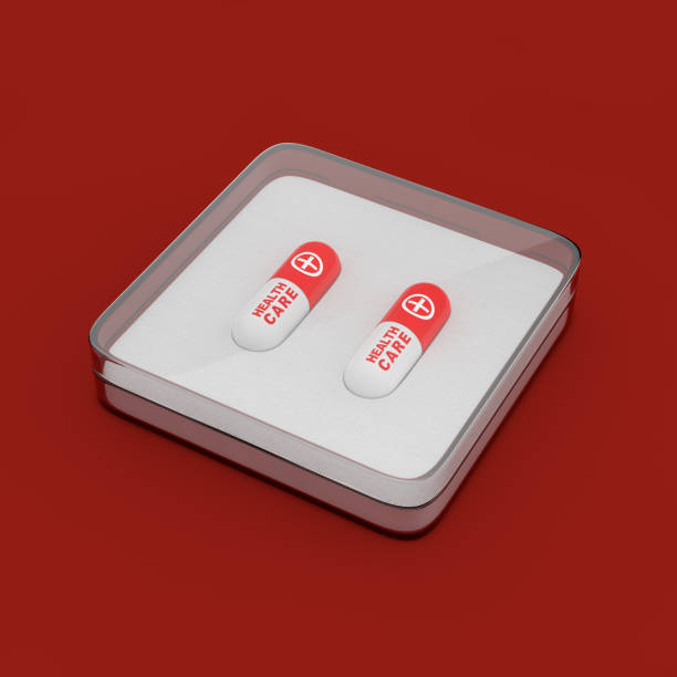 istock Two Health Care Pills Capsule in Hard Plastic Case Cover. 3d Rendering 1125580524