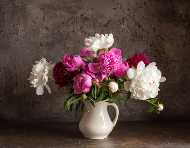 istock Still life with white and pink peonies. 1125582179