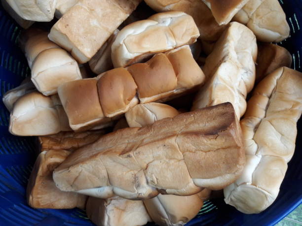 istock Pound bread in a basket for fish food. 1125583318