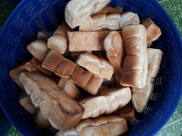 istock Pound bread in a basket for fish food. 1125583329