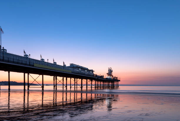 istock A pier at sunrise. Paignton Pier, Devon, UK 1125586129