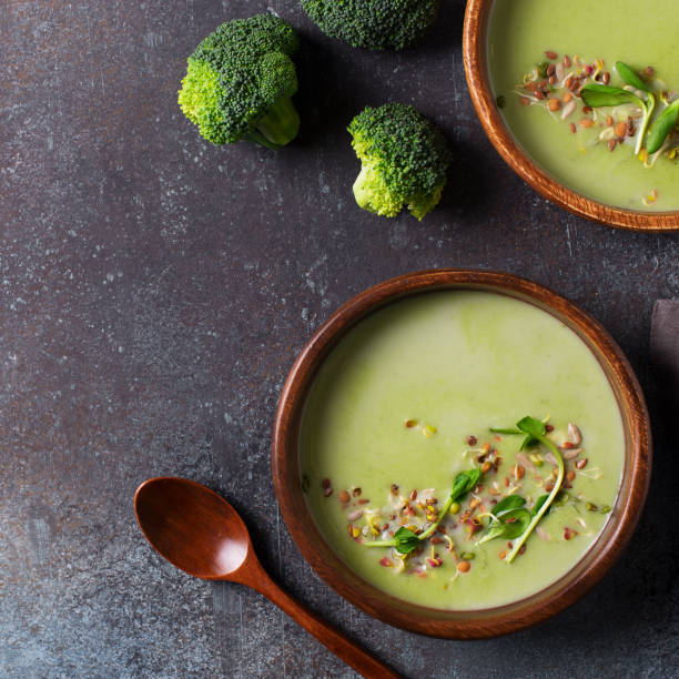 istock Green vegetable broccoli soup on dark grey background 1125590783
