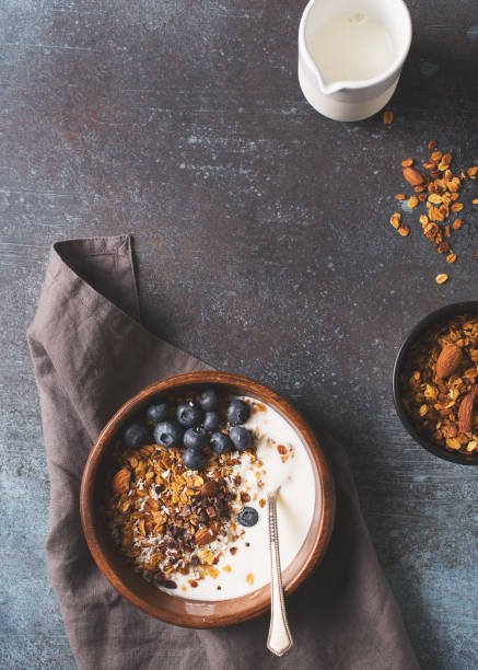 istock Homemade granola muesli with blueberries ondark grey background breakfast 1125590919