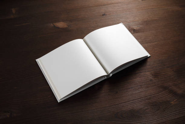 istock Book on wooden background 1125591691