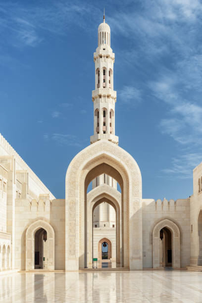 istock White marble arches and minaret, the Sultan Qaboos Grand Mosque 1125596690