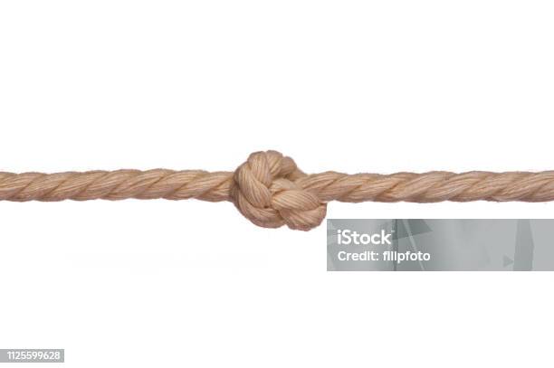 Cutting A Rope Stock Photo - Download Image Now - Rope, Cutting