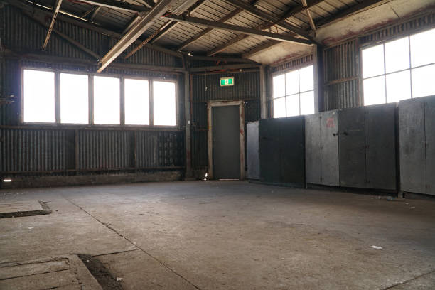 istock Interior view of generic rusty machinery factory 1125600455