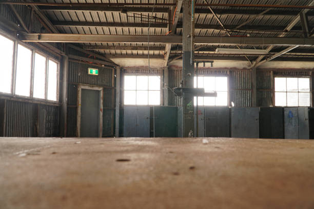 istock Interior view of generic rusty machinery factory 1125600474