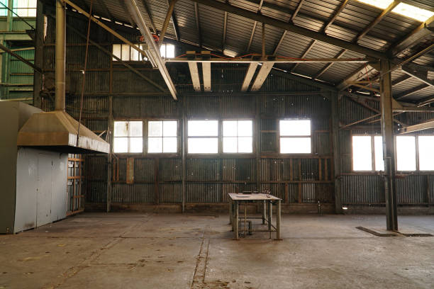istock Interior view of generic rusty machinery factory 1125600476
