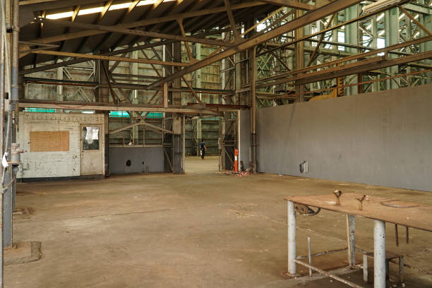 istock Interior view of generic rusty machinery factory 1125600507