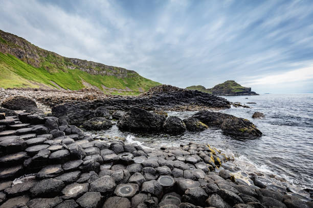 Beautiful Giants Causeway Volcanic Landscape under Dramatic Skyscape. Giants Causeway, Northern Ireland, UK