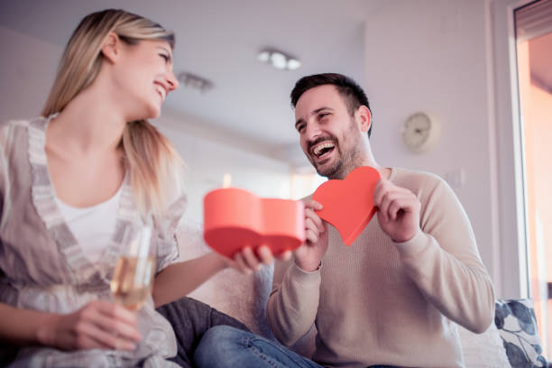 istock Man giving a gift to his girlfriend 1125602299