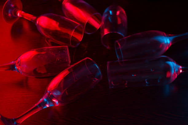 many glasses in neon light. party concept