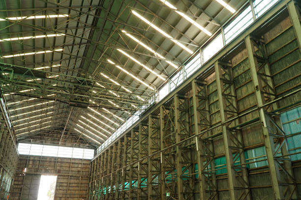 istock Interior view of generic rusty machinery factory 1125609450