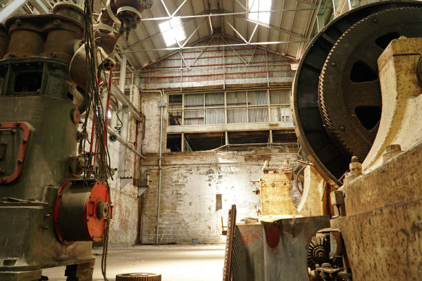 istock Interior view of old abandoned industry factory 1125609475