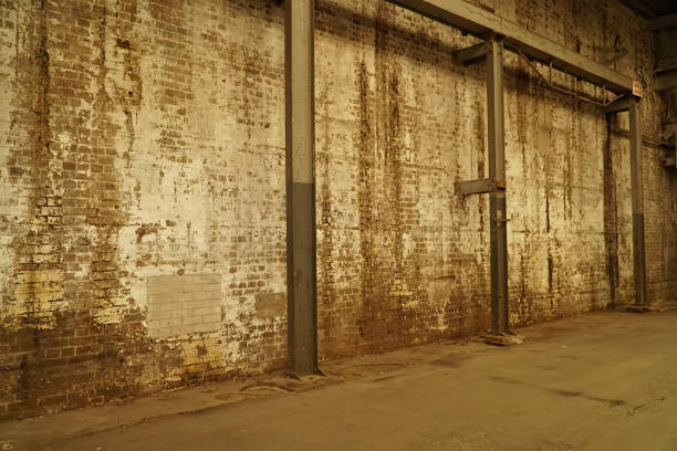 istock Interior view of generic rusty machinery factory 1125609524