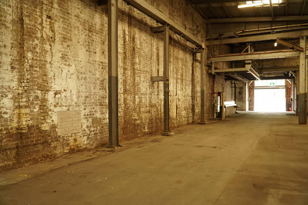 istock Interior view of generic rusty machinery factory 1125609530